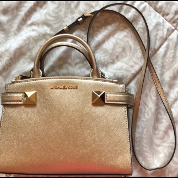 Michael Kors Handbags - Gold Michael Kors small purse!!